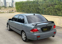 ÖZCAN OTOMOTİV‘den 2006 MODEL MİTSUBİSHİ LANCER DOLU DOLU++